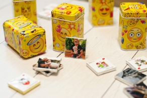 Candy with pictures in smiley-face boxes