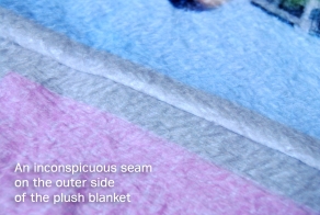 How the fabrics of a large custom photo blanket are sewn together