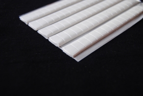 White glue dots for fixing photos on walls