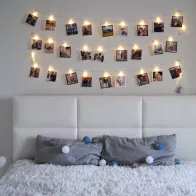 How to decorate a house with garland and photo cards