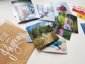 Square photo magnets in an envelope