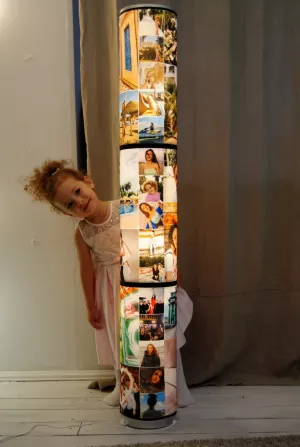 Floor lamp with family photos on the lampshade