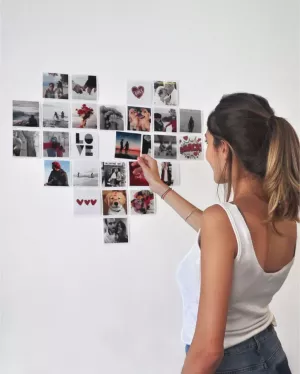 A collage of 27 photos in the shape of a heart